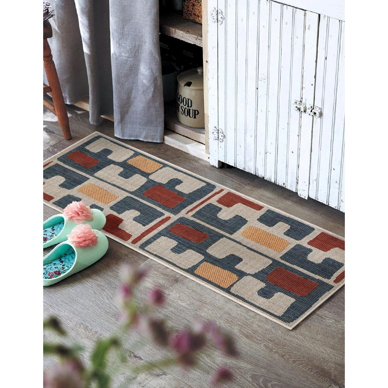 Tapis intérieur / extérieur en polypropylène tissé à la machine Dreson de couleur turquoise / beige / orange