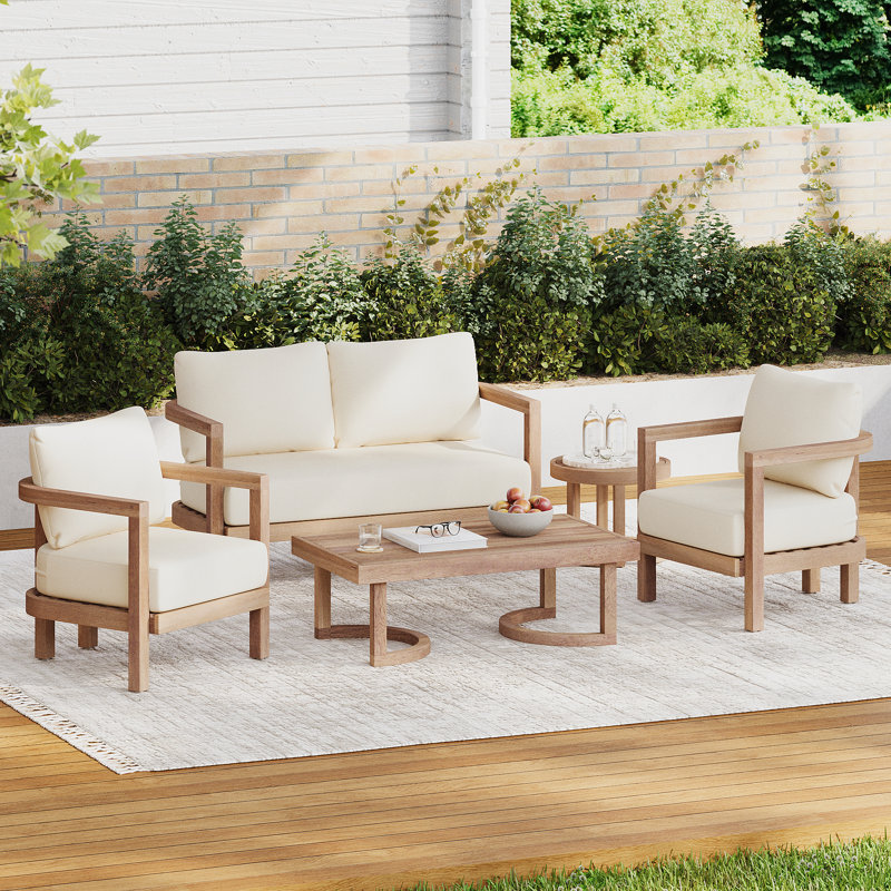 Trevohn 5-piece Outdoor Seating Group with Cushions, 4 Pieces: Coffee Table, Loveseat, 2 Chairs