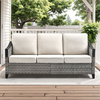 Canapé d'extérieur en résine tressée de 186 cm de large, avec coussins beiges, idéal pour terrasse, porche et jardin.