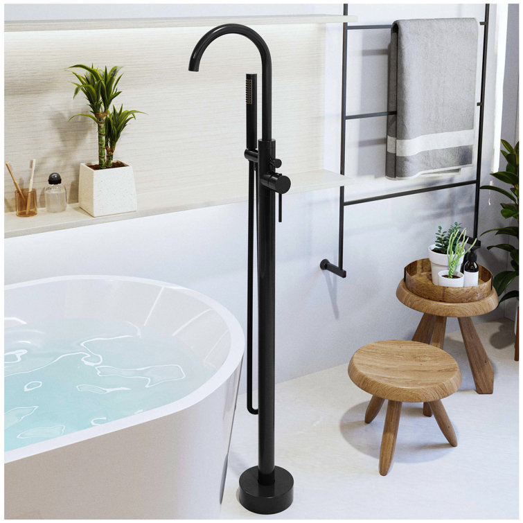 https://assets.wfcdn.com/im/60521240/resize-h755-w755%5Ecompr-r85/2312/231285097/1+Handle+Floor+Mounted+Clawfoot+Tub+Faucet+with+Diverter+and+Handshower.jpg