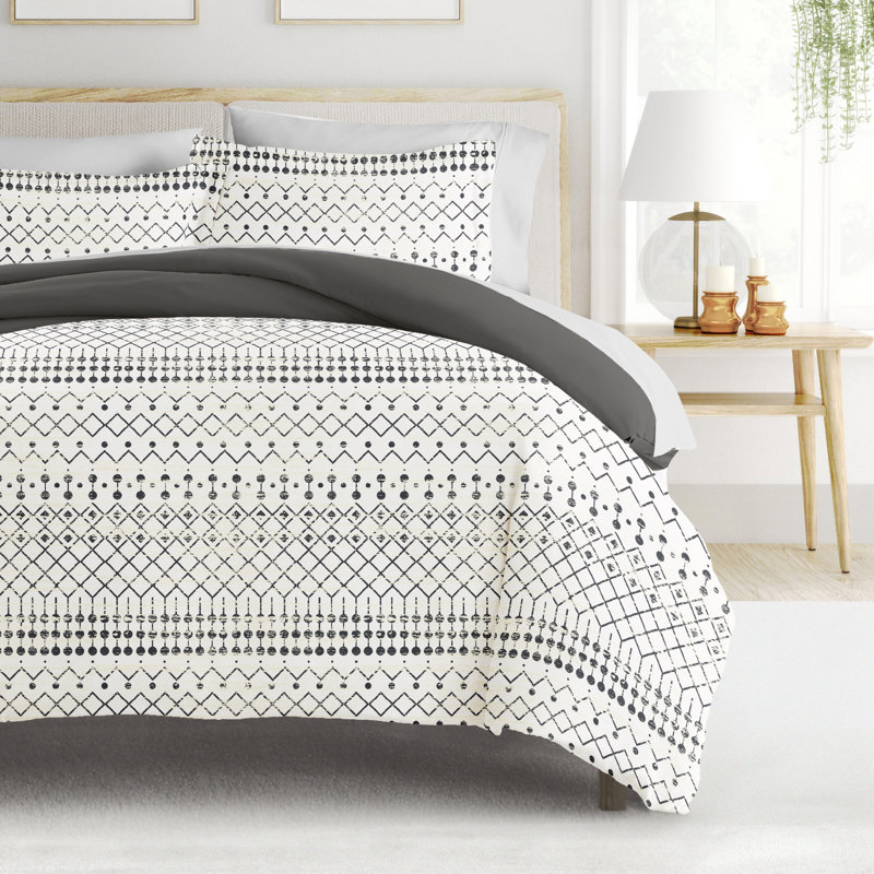 Ensemble de literie réversible 8 pièces - Housse de couette à motif, insert d'édredon et ensemble de draps unis