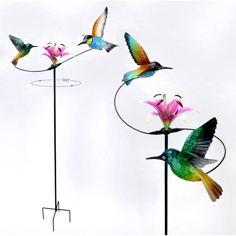 Colibri cinétique et piqueur à fleur