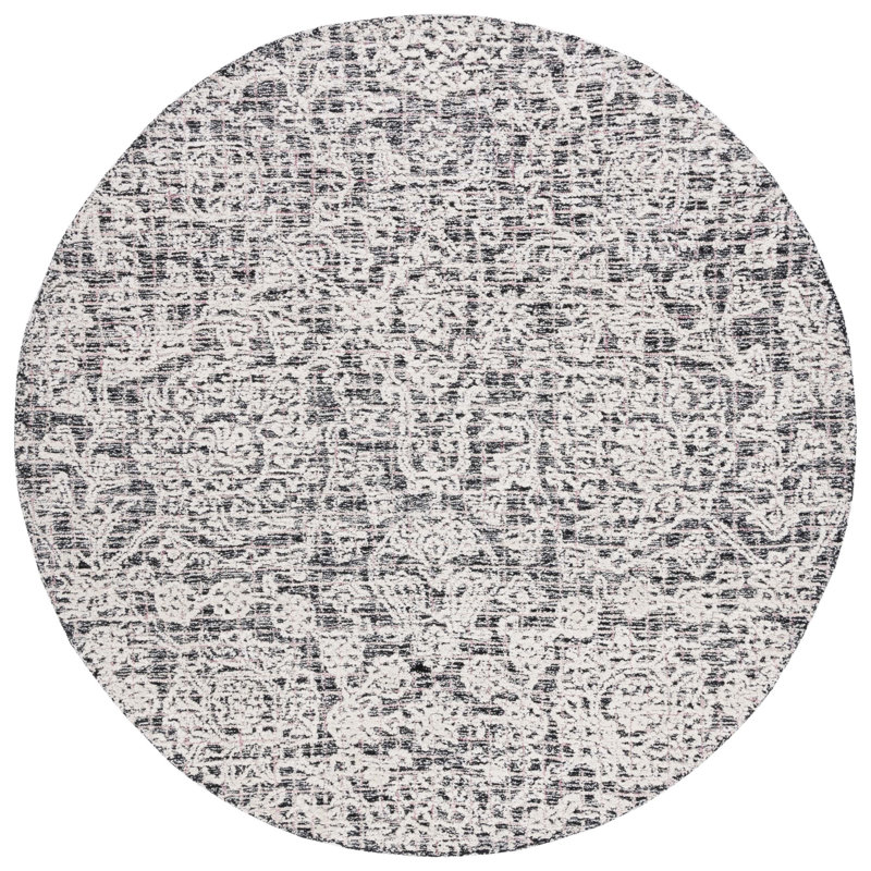 Caniah Hand Tufted Wool/Viscose/Cotton Floral Rug in Black/Ivory, Round 6'