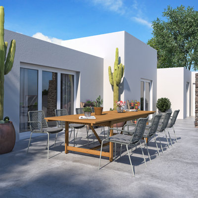 Anautica 8 - Person Eucalyptus Solid Wood Patio Dining Set Rectangular Table with Cushions Included