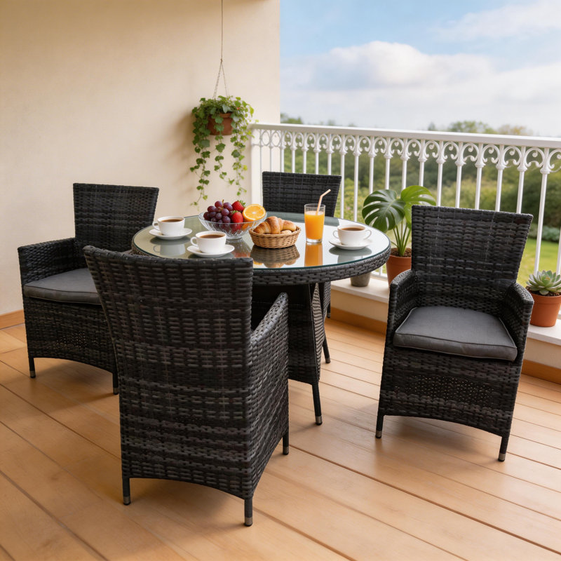 Strunk 4 - Person Patio Dining Set with Round Table , Cushions Included, Grey, Grey