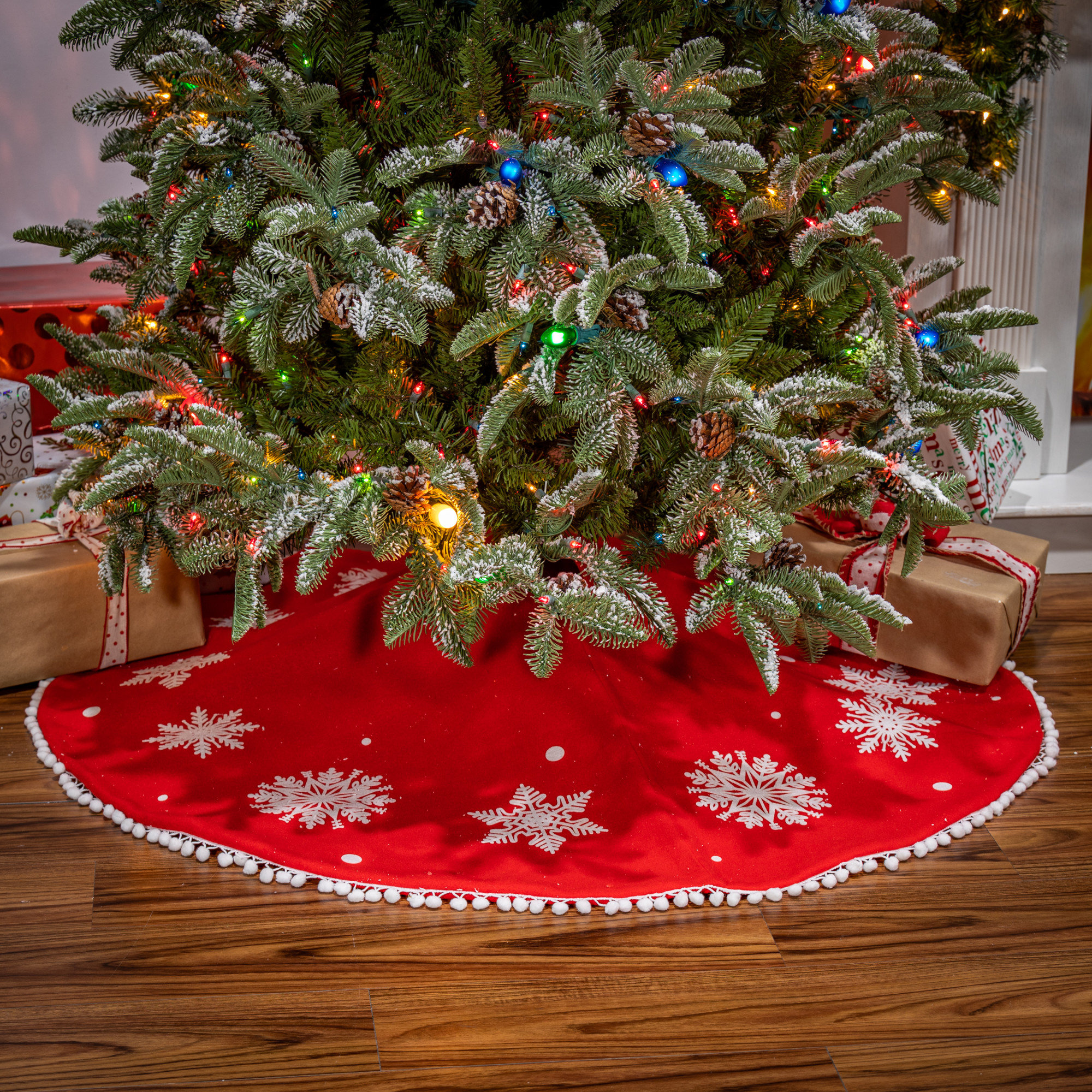 48 In. Red Velvet Tree Skirt With White Snowflakes And Pom Poms