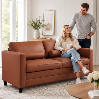 Causeuse-lit double en similicuir cognac