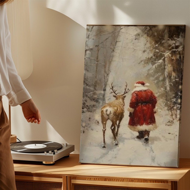 Toile «A Cosy Winter Scene Doté d'une figure dans un art mural rouge avec bordure blanche marchant le long d'un doux renne à travers l'art mural