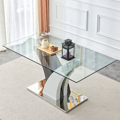 La table de salle à manger moderne, le comptoir en verre trempé et les pieds en panneau de fibres à densité moyenne artistiques sont parfaits pour les dîners, les conférences, la maison et les décorations de bureau.