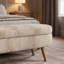 Repose-pieds ovale avec rangement en tissu plissé, pieds en bois d'hévéa massif et intérieur spacieux - Repose-pieds polyvalent, sièges supplémentaires et pièce décorative-446963522-446963641