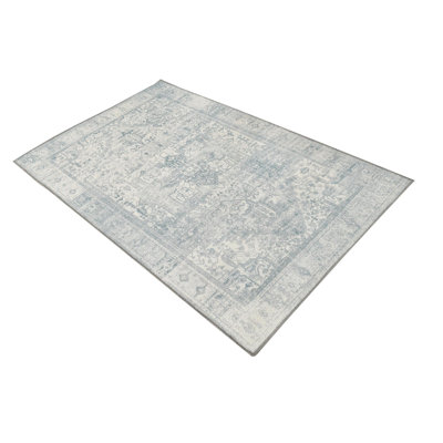 Tapis transitionnel de couleur ivoire / bleu sarcelle