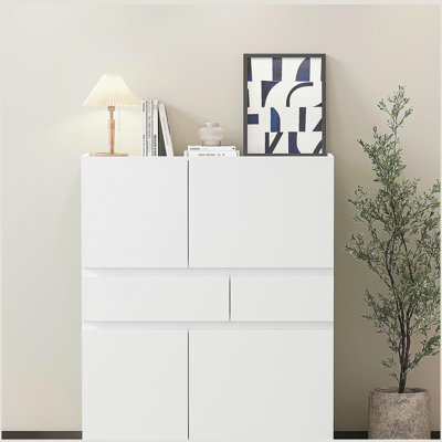 White wooden storage cabinet with 4 doors and 2 drawers