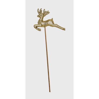 Renne scintillant sur bois