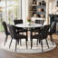 Ensemble de table de salle à manger moderne blanc rond avec 6 chaises en polyuréthane noir, structure en métal pour la maison