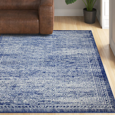 Porphyrion Geometric Area Rug