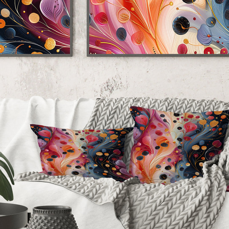 Coussin lombaire orange avec motif floral orange et noir