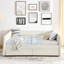 Lit de jour avec lit gigogne, compartiments de rangement spacieux, grand lit, rembourré, boucle beige, rayures verticales élégantes, rembourrage de siège confortable, tiroirs à installation rapide, tissu bouclé, dossier rayé,
