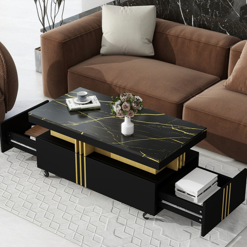 Table basse noire avec tiroirs pratiques et roulettes