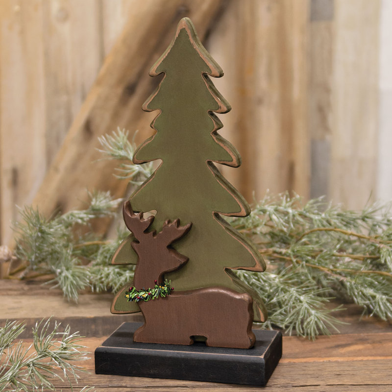 Pin et renne en bois sur base
