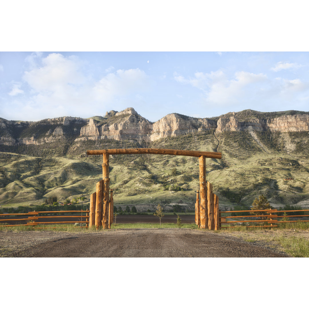 Ranch Gate And Cliffs In Wyoming, USA