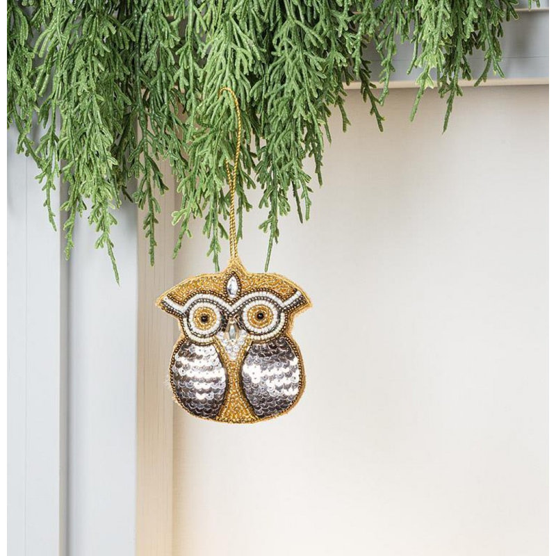 Ornement perle hibou