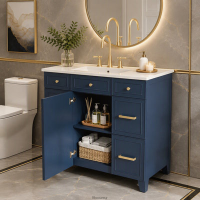 Meuble-lavabo bleu de 91 cm (36 pouces) avec lavabo en céramique, structure en bois massif, portes à fermeture amortie, étagères réglables et 3 tiroirs avec rangement pour sèche-cheveux.