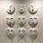Aralene 10" White Ceramic Face Round Wall Decor