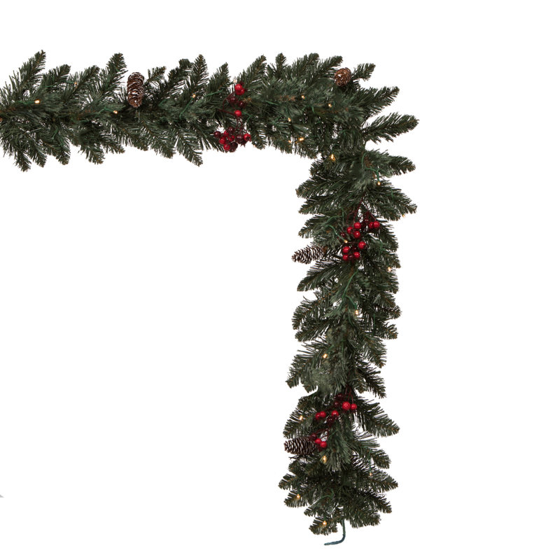 Vickerman Artificial 4 Piece Decorated Front Door Set with 200 Battery Operated Warm White 3MM LED lights. Includes two 3.5' Potted Trees, one 30" Wreath and one 9' Garland.