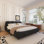 Lit plateforme de luxe avec dossier surdimensionné rembourré, lit plateforme tapissier, lit unique