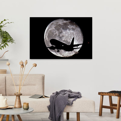 Jet en silhouette devant la lune, art contemporain de paysage contemporain