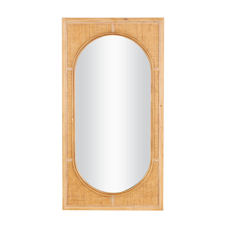 Miroir mural en rotin brun avec centre ovale