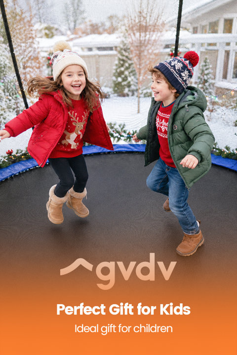 Two young children in winter clothing jumping on a backyard trampoline during a snowy day, with text overlay reading GVDV Perfect Gift for Kids, Ideal gift for children.
