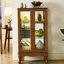 Vitrine lumineuse avec tablettes réglables et panneaux miroirs, idéale pour mettre en valeur des collections variées dans n'importe quel espace-776517886