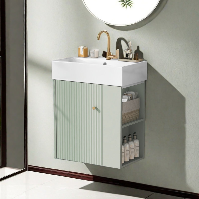 Meuble-lavabo flottant moderne avec lavabo en céramique, porte à motif ondulé, poignée en or rose, rangement sur le côté droit, porte à fermeture en douceur, conception compacte pour les petites salles de bain