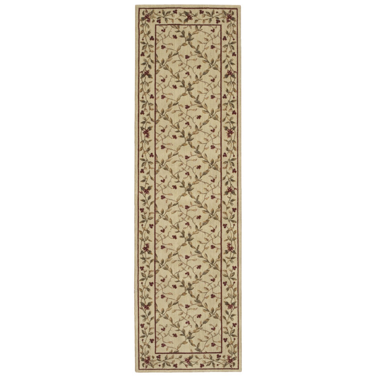 Tapis à aire beige en laine Fairchild