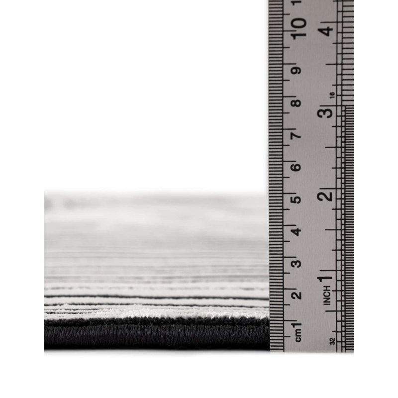 Tapis géométrique en polyester noir / blanc Bralin, Rectangle 6 pi 1 po x 9 pi