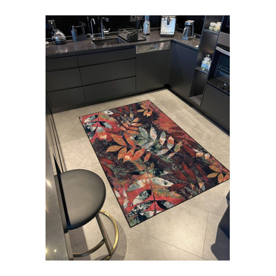 Tapis noir lavable à motif floral noir