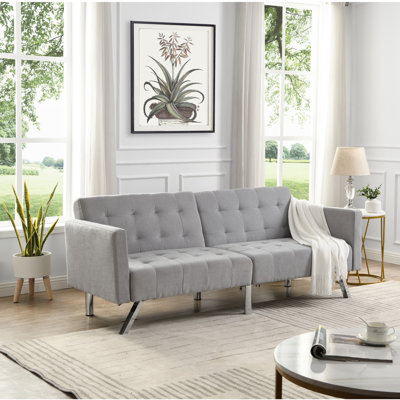 Canapé-lit pliant gris pour un appartement convertible élégant et pratique