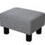 Tabouret gris avec housse en lin et pieds robustes en plastique pour le repos de style salon, petit