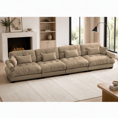 Canapé d'angle modulaire surdimensionné en velours ultra confortable avec pouf amovible, assise profonde et design convertible en L pour les salons modernes
