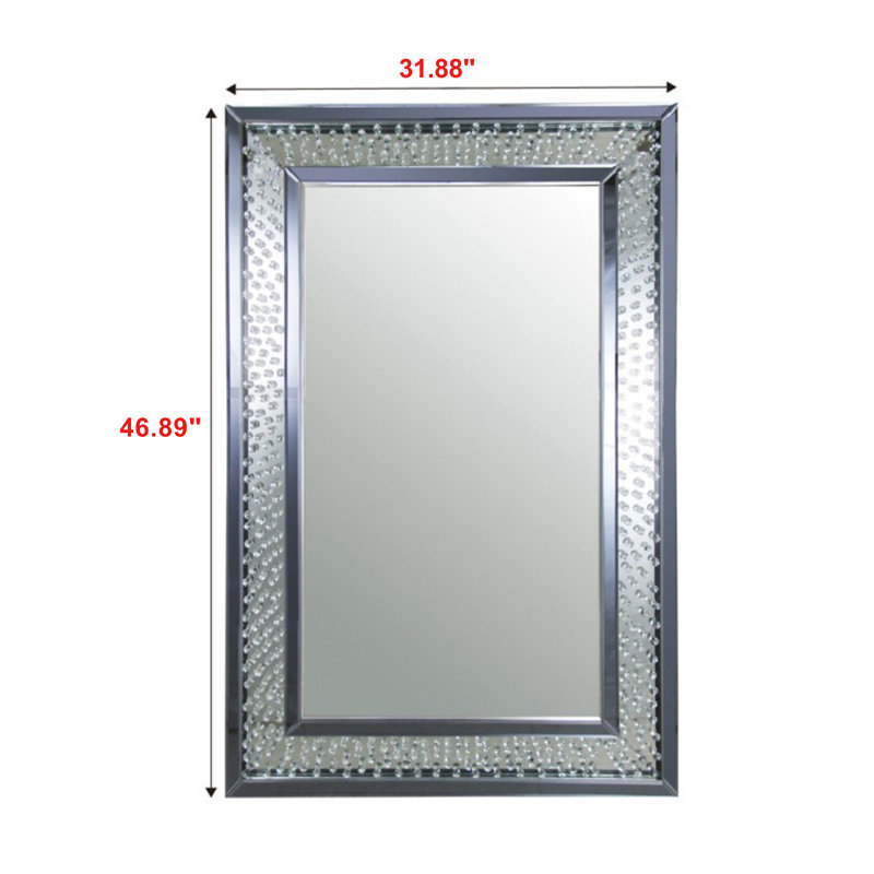 Ce miroir d'appoint Farnborough est en miroir et en faux cristal