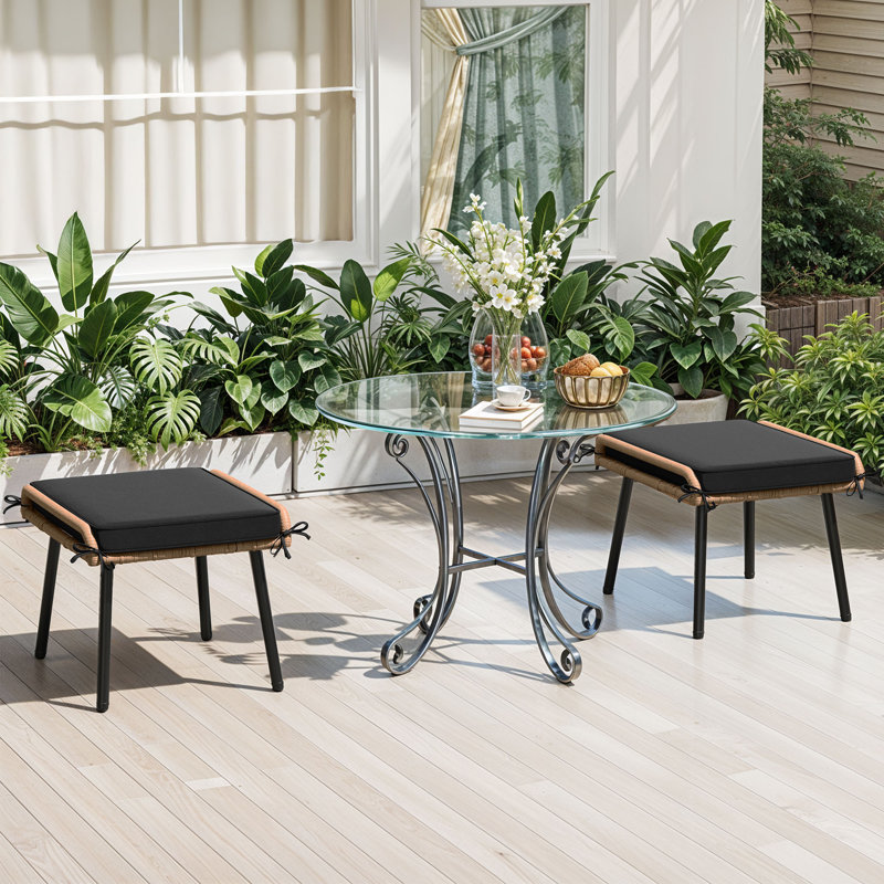 Milam Beige Rattan Outdoor Ottomans with Black Cushions, Set of 2