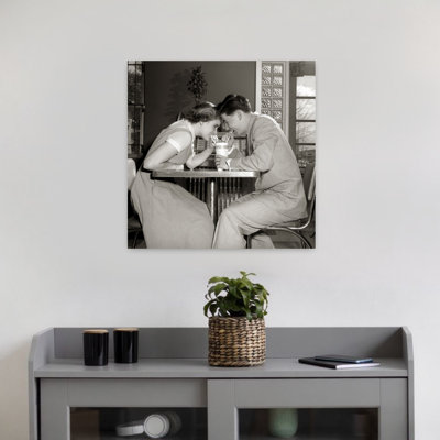 1950S 1960S Laughing Teenage Couple Boy And Girl Sharing Drink Together With Two Straws In Soda Shop Romantic Contemporary Wall Art