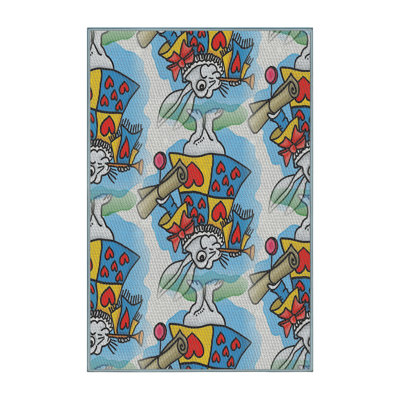 Tapis bleu/rouge à motifs