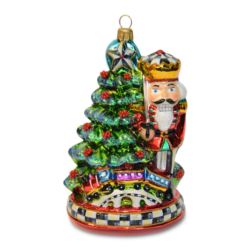 Nutcracker By Tree Glass Ornament