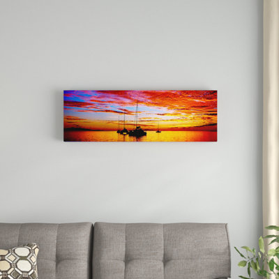 «Silhouette de voiliers dans l'océan au coucher du soleil, Tahiti, îles de la société, Polynésie française», reproduction de photo sur toile tendue
