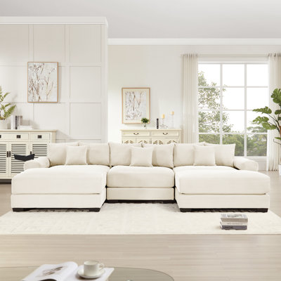 Canapé modulaire en velours côtelé avec repose-pieds et coussins Cohette