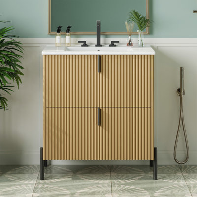 Meuble-lavabo autoportant de 30 po avec lavabo en céramique muni de poignées verticales et de tiroirs pleine extension