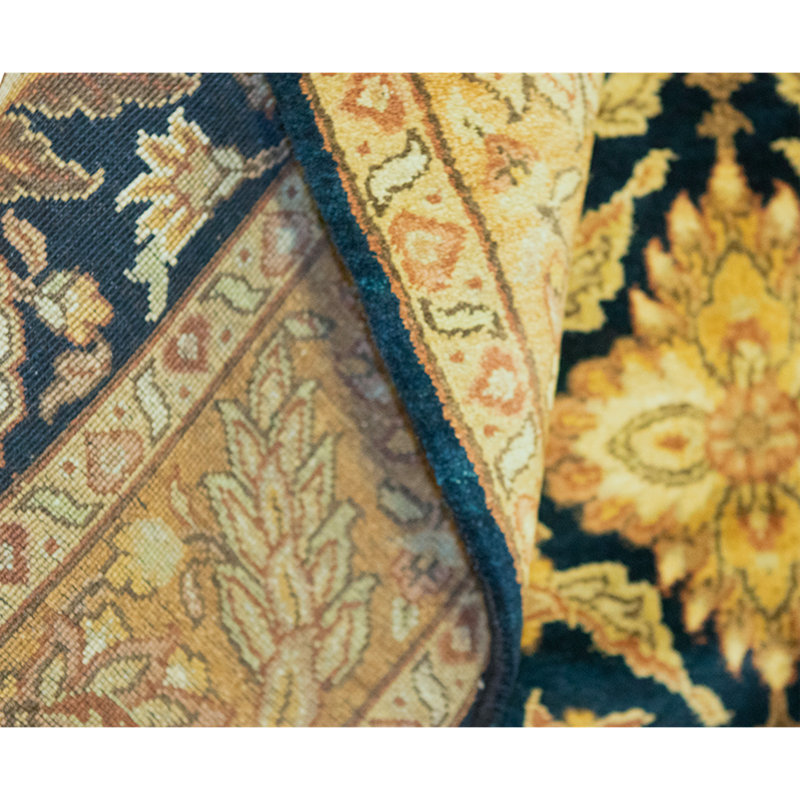 Hand Knotted Wool Area Rug in Black And Gold