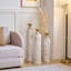 Ensemble de 3 vases de sol en métal blanc décoré blanc